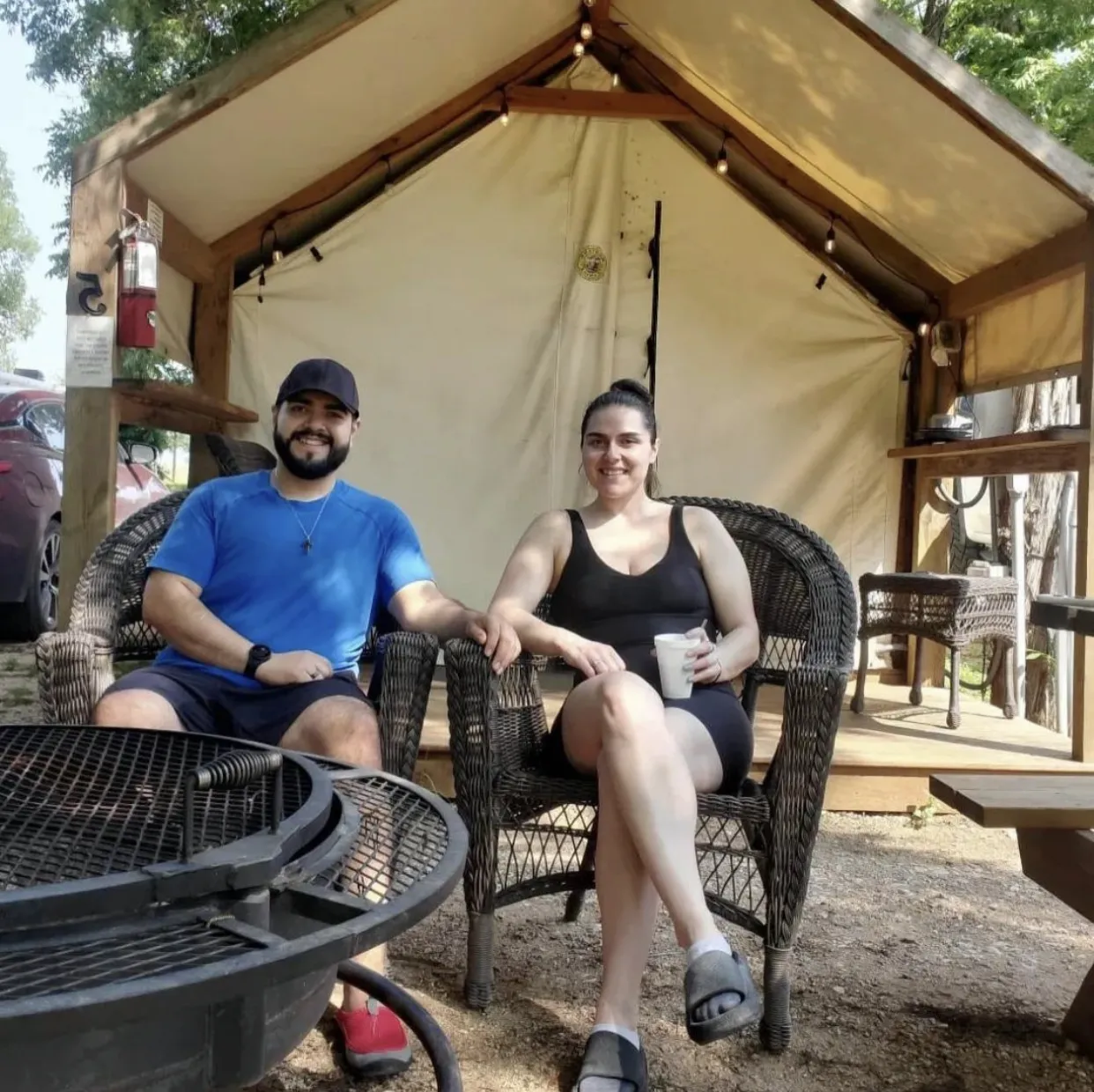 Couple relaxing at Glamping Cabin